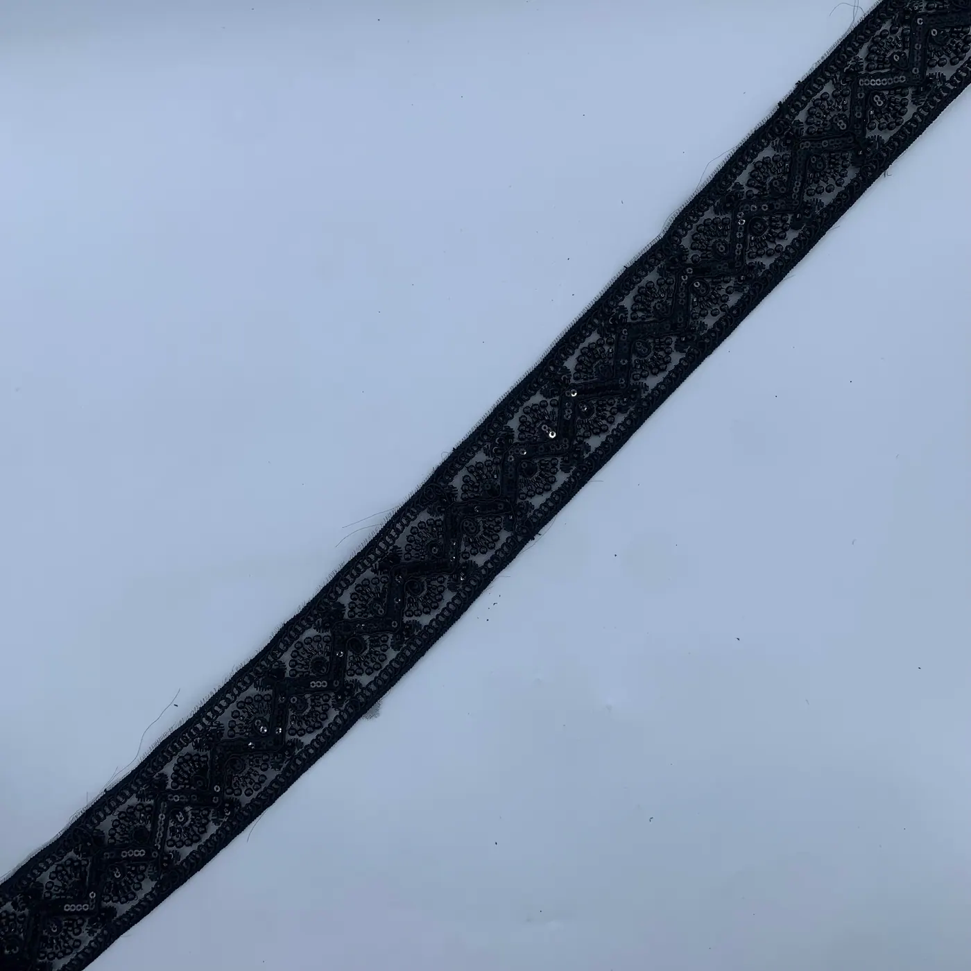 Black scroll lace border
