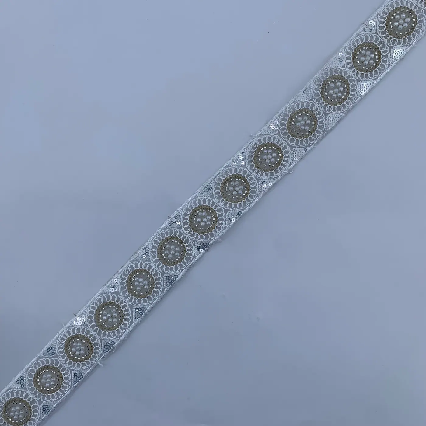 Ivory & gold medallion trim