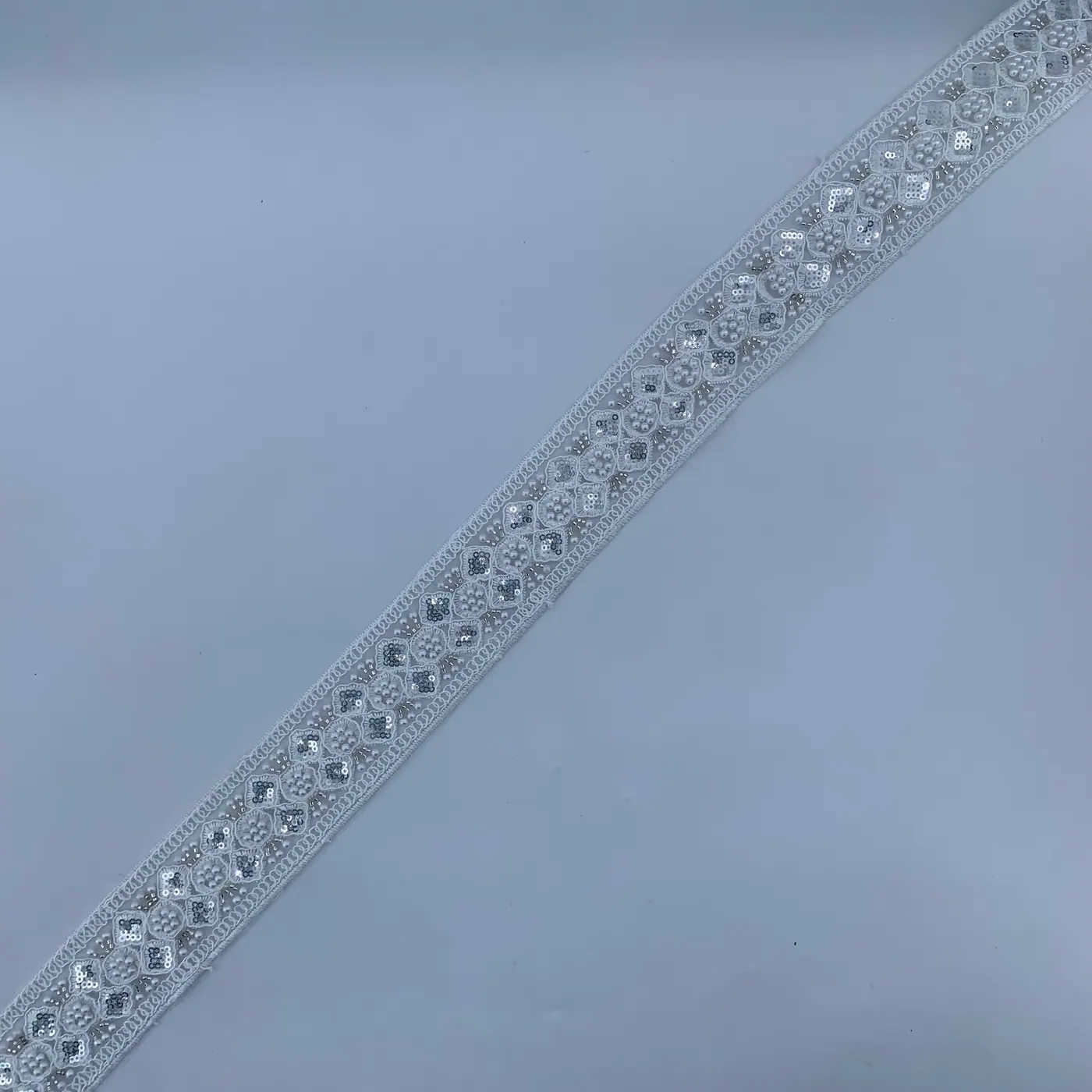 White oval chain trim